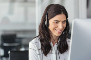 Call center business woman talking on headset