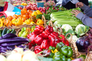 fresh produce on display in baskets